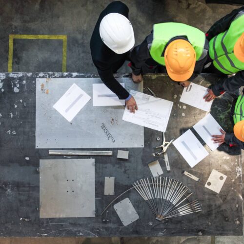 engineers discussing building plans
