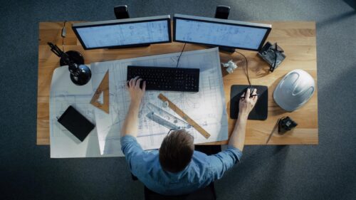 above view of a man working at his desk