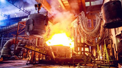 Steel, Factory, Business, Industry, Africa - Scrap metal being poured into an Electric Arc Furnace