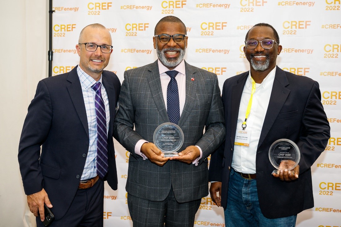 From left to right: RMI Islands Director of Projects Chris Burgess; Bermuda Minister of Home Affairs Hon. Walter Roban receiving Caribbean Energy Leader MVP, and Burlington Strachan, Chief Operating Officer, Bahamas Power and Light, receiving Best Resilience Project