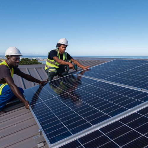 solar panel technicians installing panels